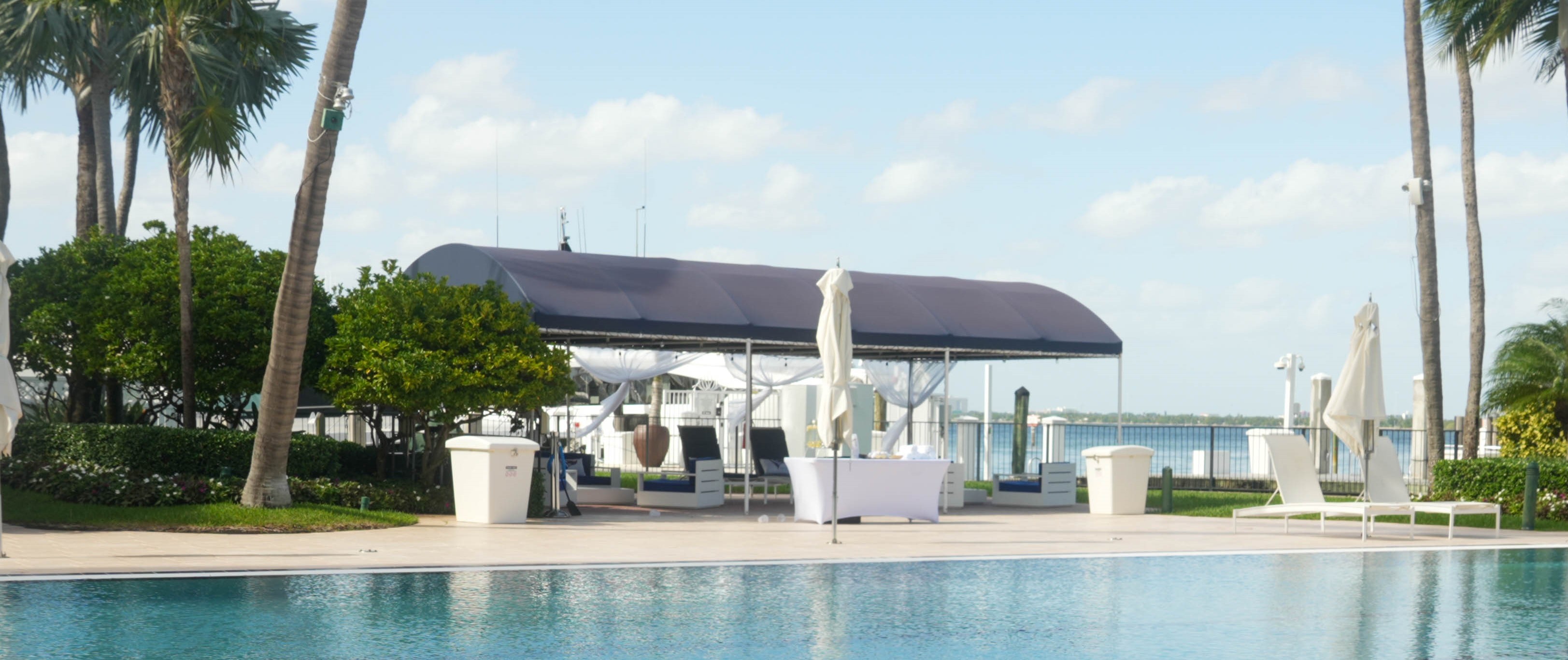 Pool deck and pavilion decorated for an event